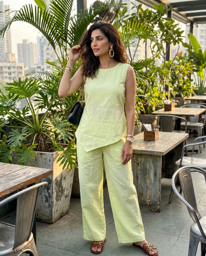 Woman wearing Solie Two Piece Set Tunic Top Wide Leg Trousers Co Ord set standing against rooftop garden