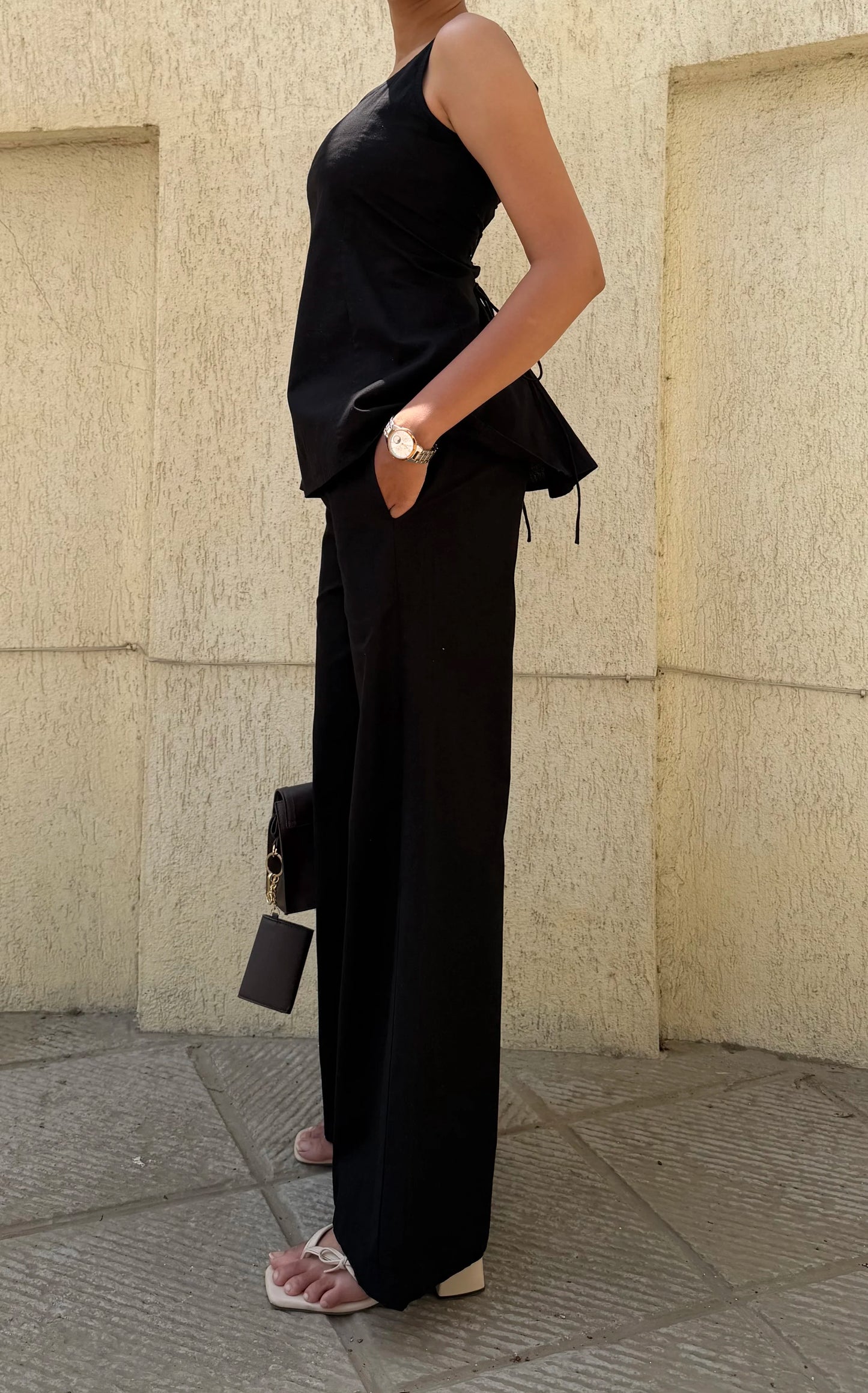 Woman wearing Sunday in St Tropez Black Co Ord Set Wide Leg side view